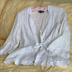 Cute little white eyelet top with a tie.